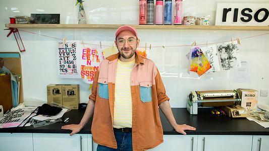 Postgraduate student in a studio with art equipment