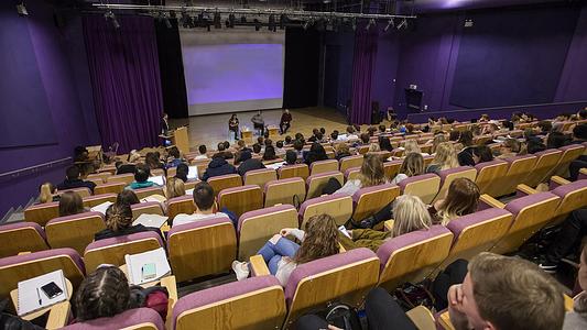 Panel discussion in RLB Lecture Theatre 1 - screen images and text blurred out (original file 1707338.jpg in archive)