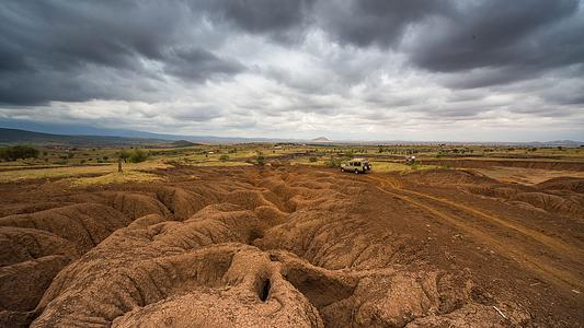 Offroad vehicle in arid plains of East Africa