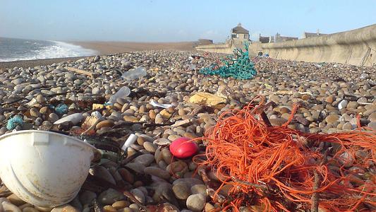 Chesil Beach with marine litter.
