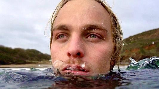 Male swimming in the sea, only his head above water. Filmmaking hero resized