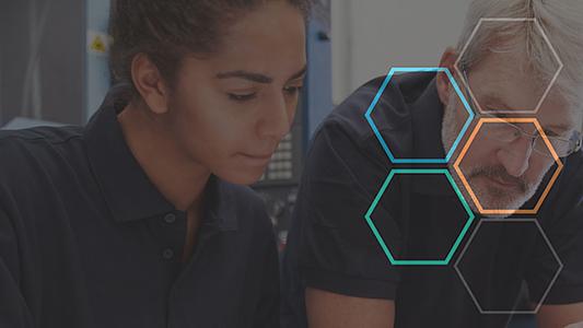 An apprentice with her mentor.