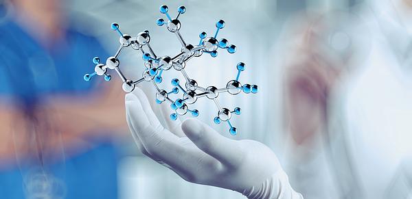 scientist doctor hand holds virtual molecular structure in the lab as concept courtesy of Shutterstock