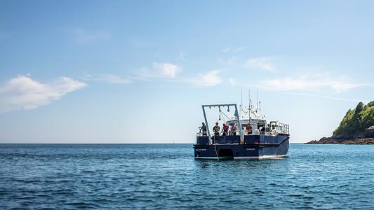Students on the Falcon Spirit boat on Plymouth Sound